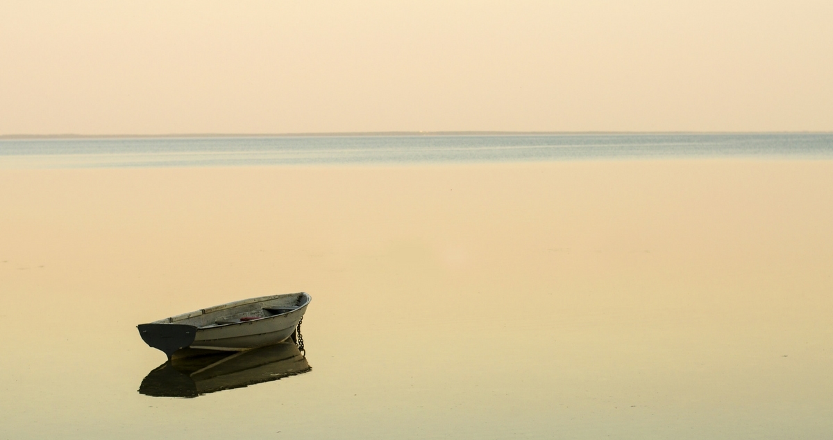 Lonely boat on an empty sea