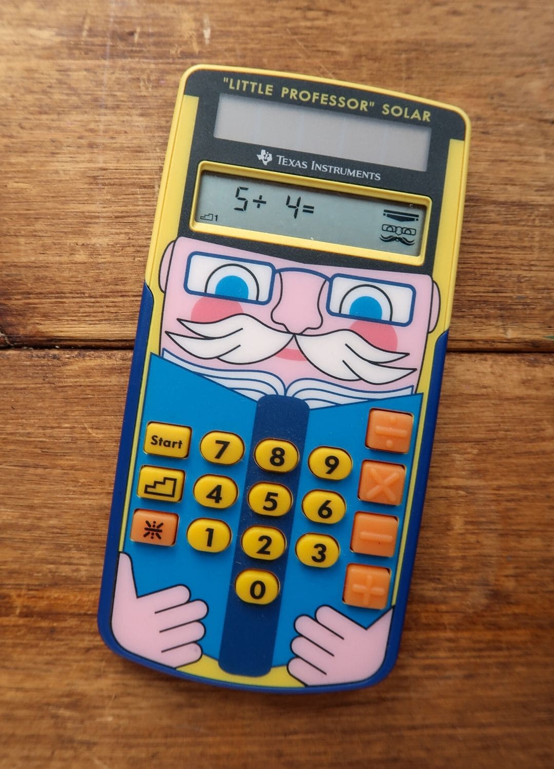 Close-up of little professor maths toy