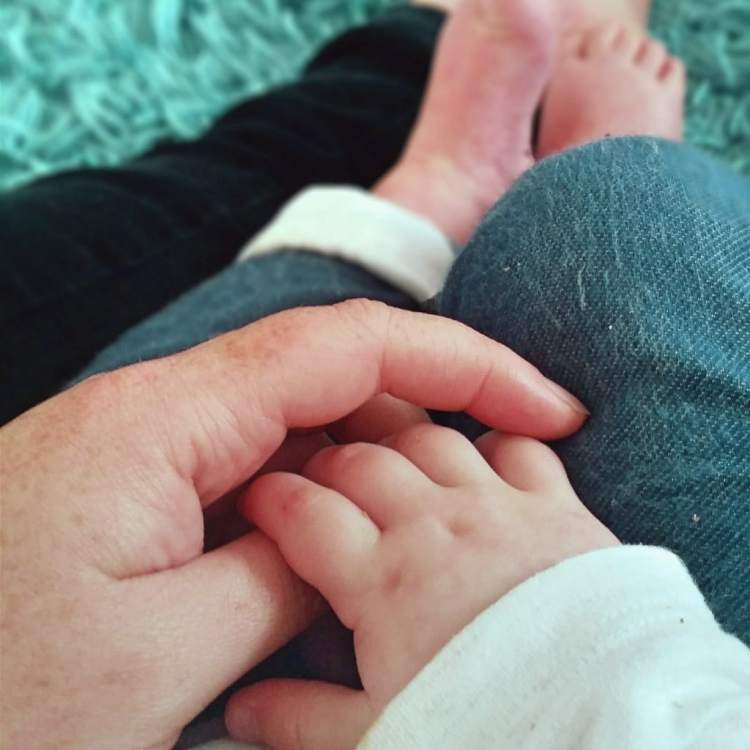 Littlest, holding mummy's hand