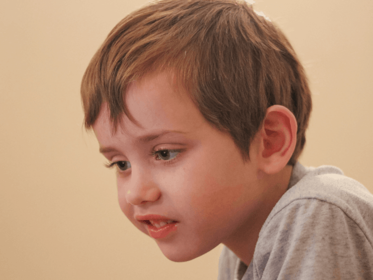 Portait close-up of a boy smiling